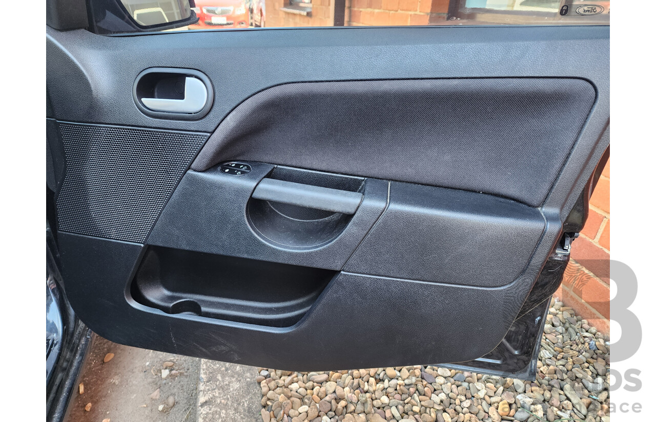 4/2007 Ford Fiesta Zetec WQ 5d Hatchback Black 1.6L