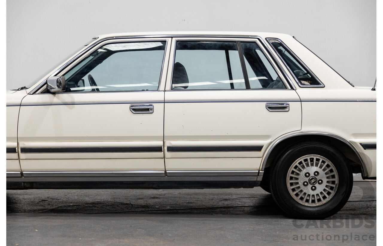1/1985 Nissan 300 C (Cedric) PY30 4d Sedan White 3.0L