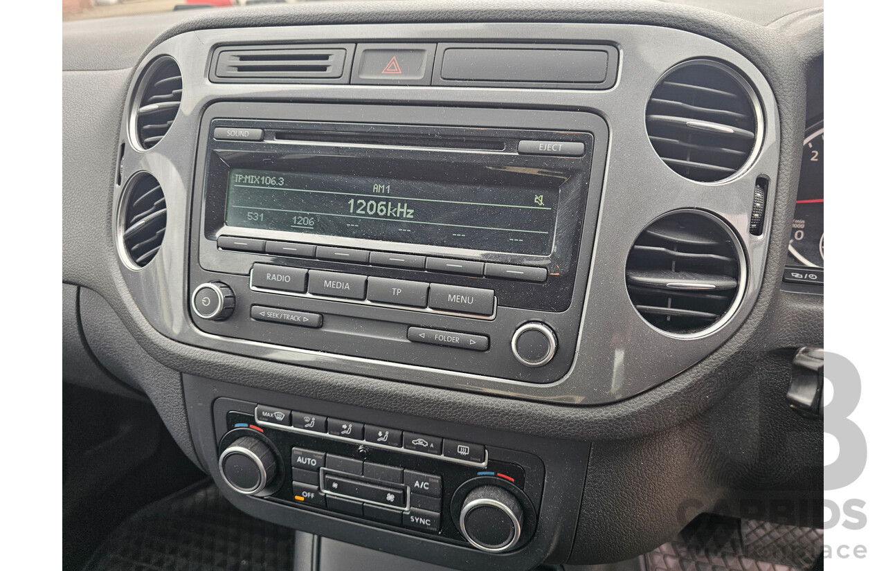 4/2013 Volkswagen Tiguan 103 TDI 5NC MY13 4d Wagon White 2.0L