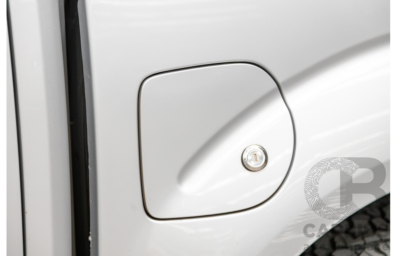 06/2012 Nissan Navara ST (4x4) D40 MY12 4d Dual Cab P/Up Silver Turbo Diesel 2.5L