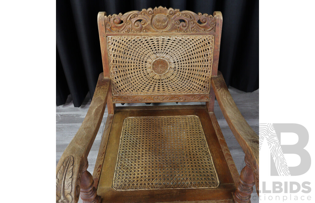 Pair of Vintage Heavily Carved Tropical Hardwood Armchairs