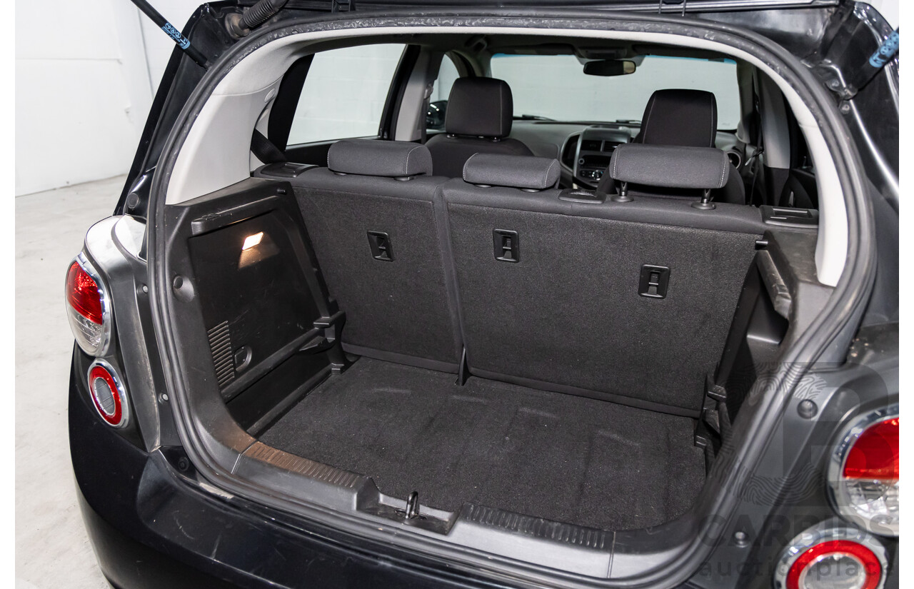 5/2012 Holden Barina  TM 5d Hatchback Carbon Flash Black Metallic 1.6L