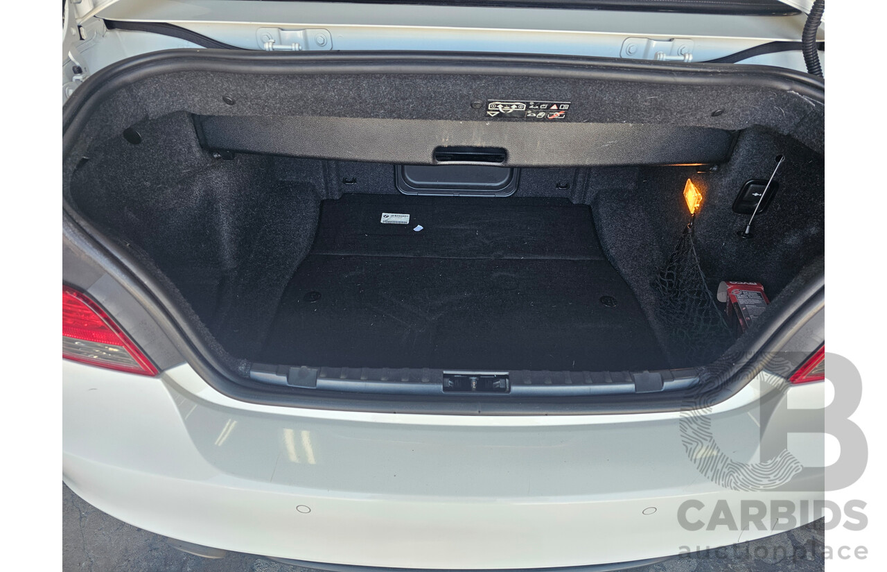 6/2010 BMW 118d E88 MY09 2d Convertible White 2.0L