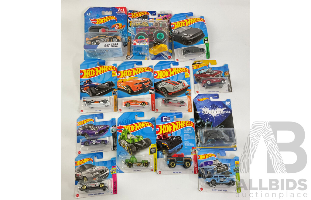 Collection of Boxed Hot Wheels Including Monster Trucks and Key Cars