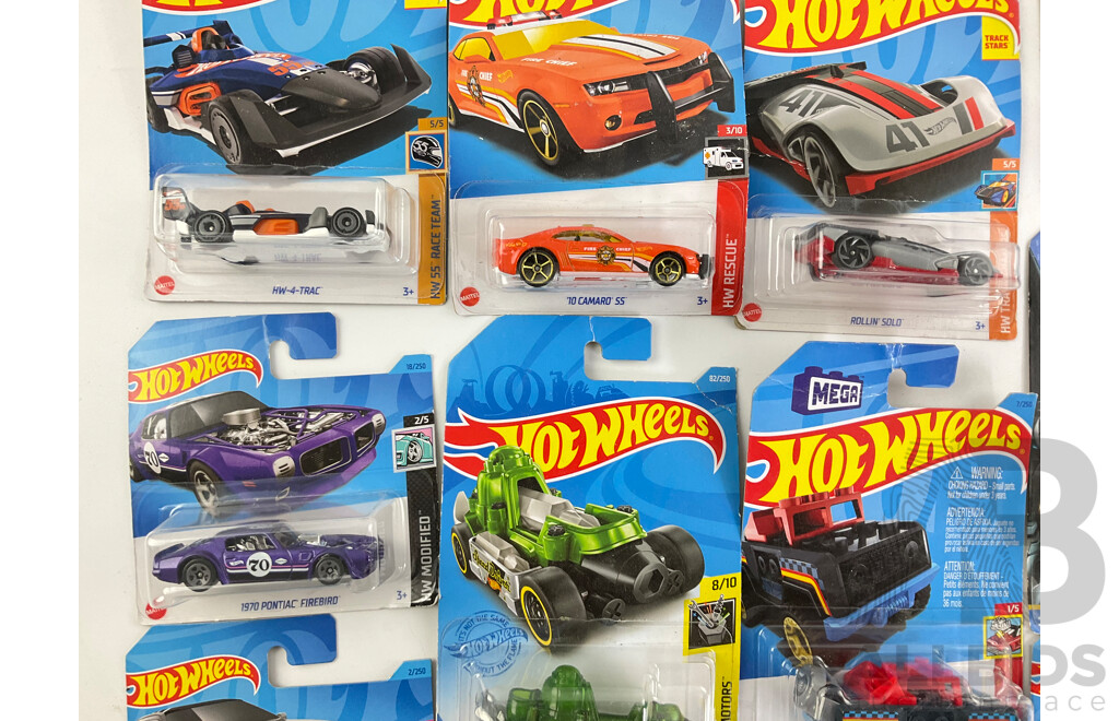 Collection of Boxed Hot Wheels Including Monster Trucks and Key Cars