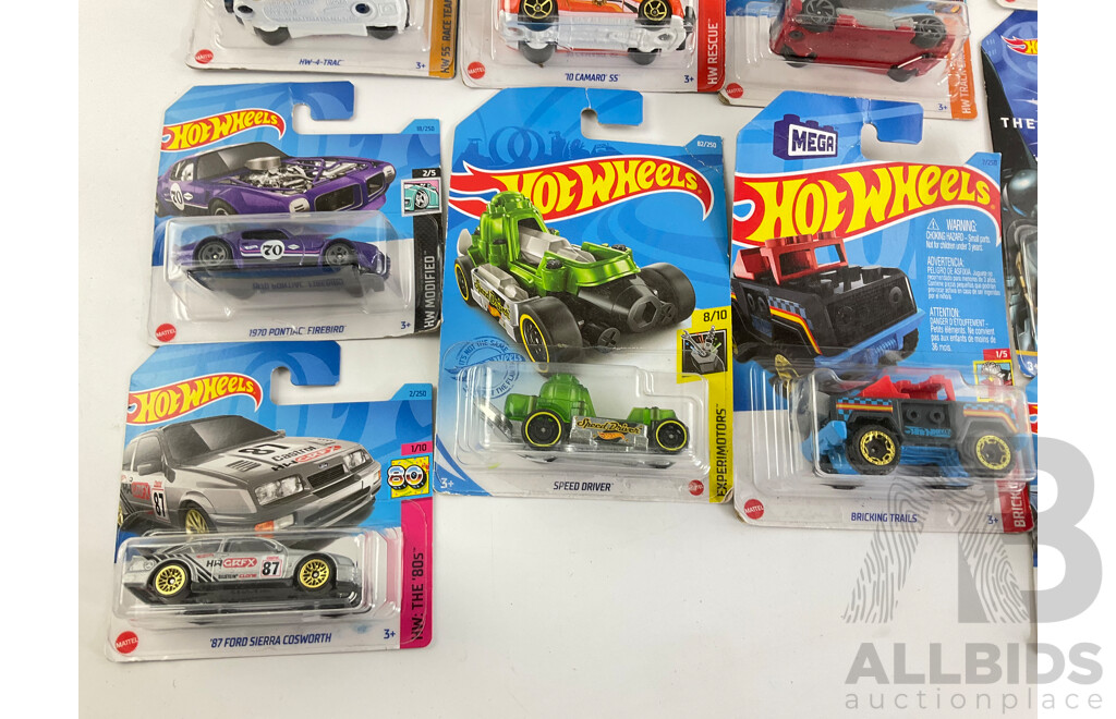 Collection of Boxed Hot Wheels Including Monster Trucks and Key Cars