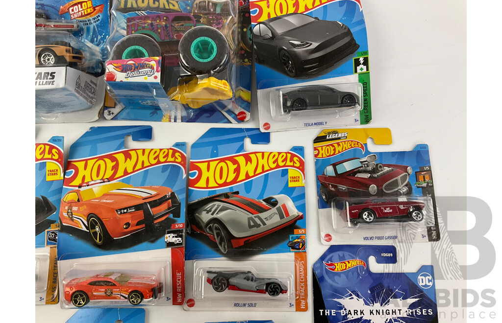 Collection of Boxed Hot Wheels Including Monster Trucks and Key Cars