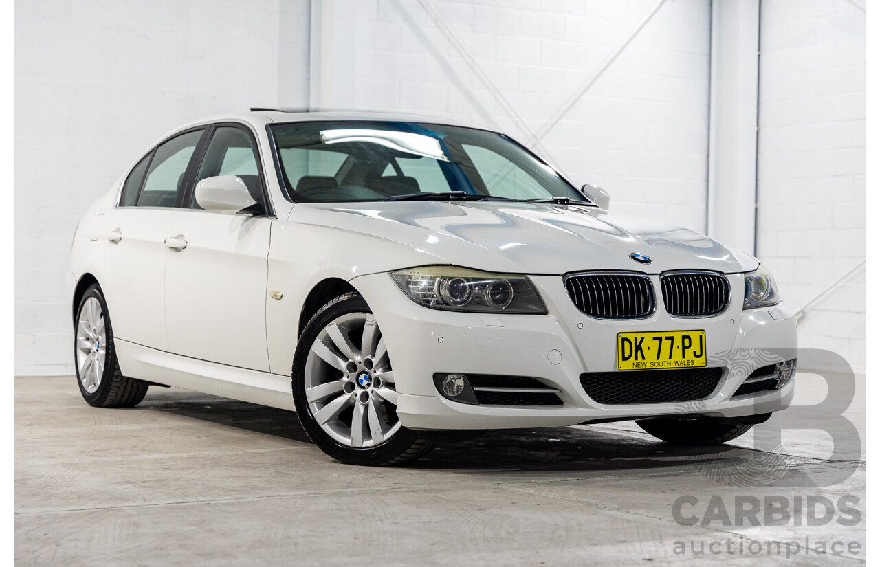 9/2010 BMW 325i Exclusive E90 MY10 4d Sedan Alpine White 2.5L