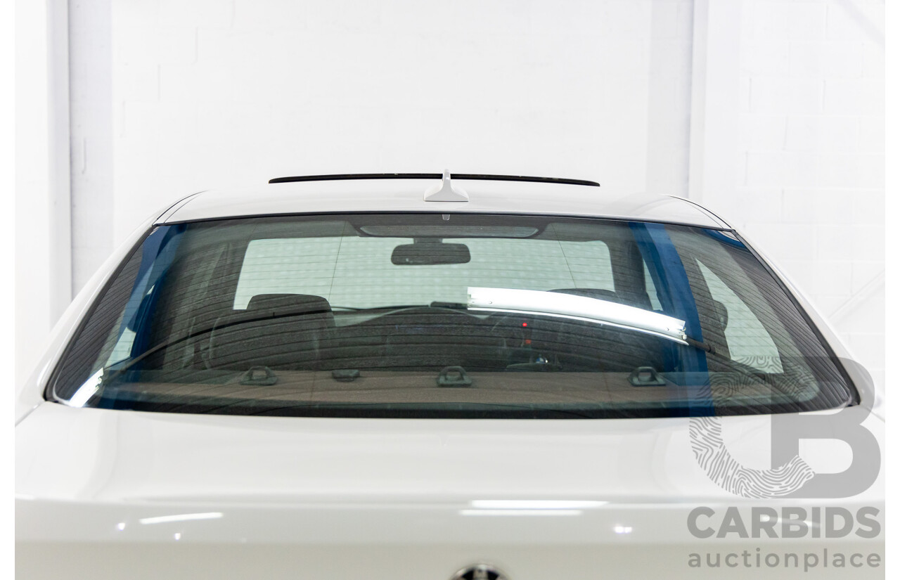 9/2010 BMW 325i Exclusive E90 MY10 4d Sedan Alpine White 2.5L