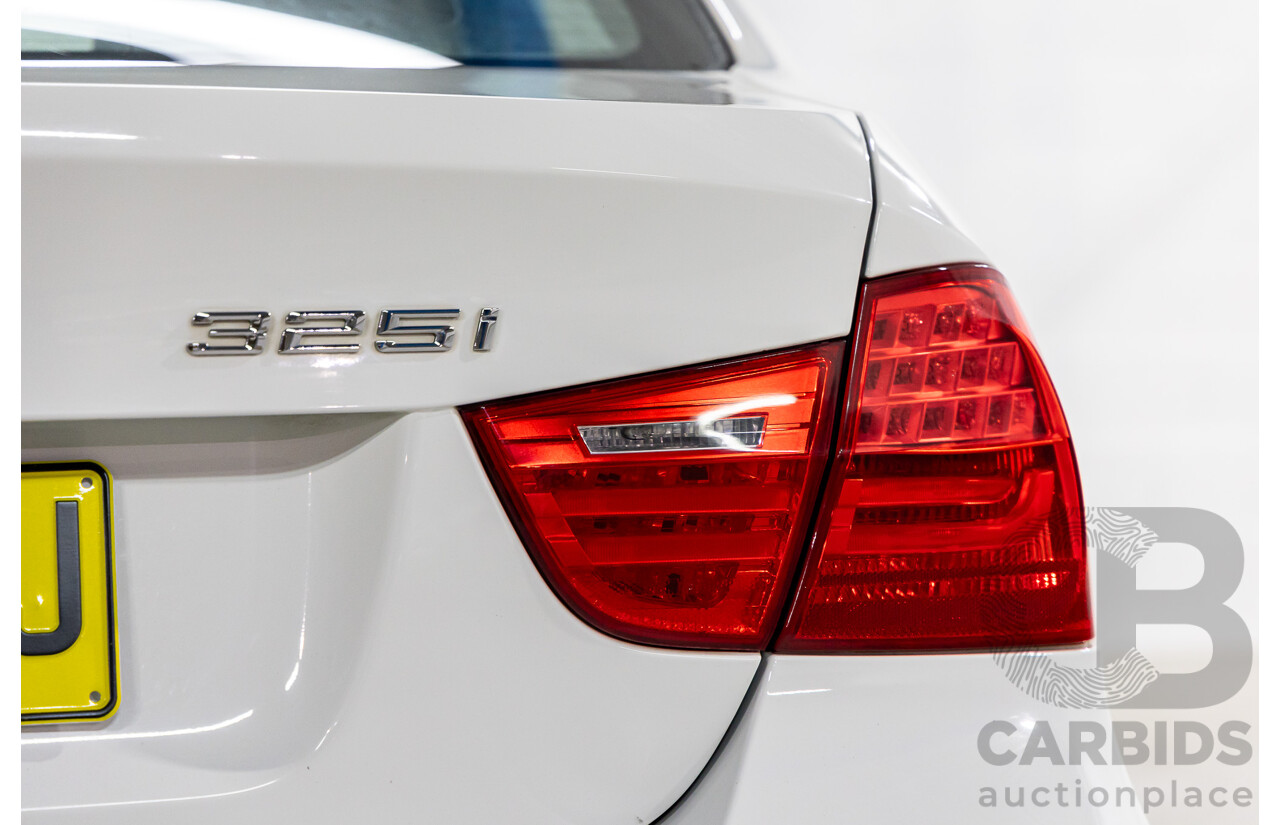 9/2010 BMW 325i Exclusive E90 MY10 4d Sedan Alpine White 2.5L