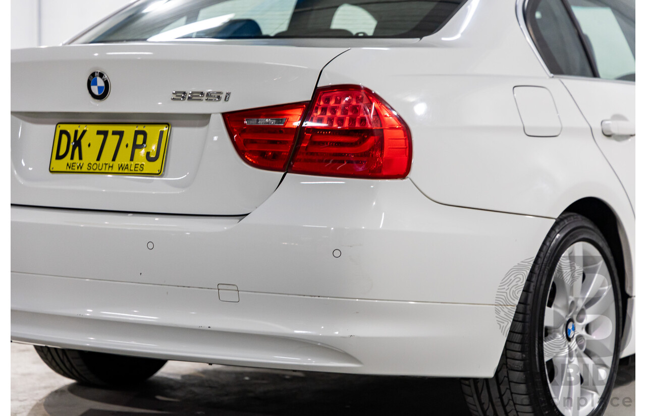 9/2010 BMW 325i Exclusive E90 MY10 4d Sedan Alpine White 2.5L