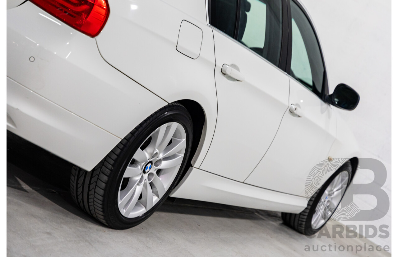 9/2010 BMW 325i Exclusive E90 MY10 4d Sedan Alpine White 2.5L