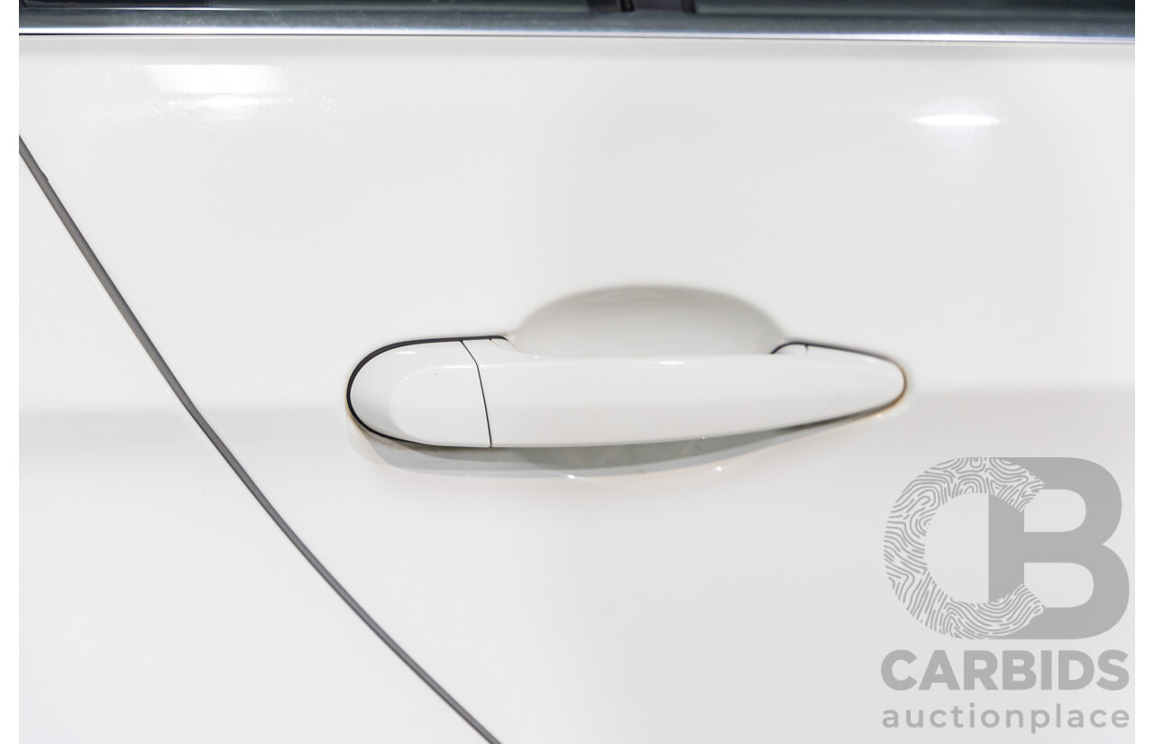 9/2010 BMW 325i Exclusive E90 MY10 4d Sedan Alpine White 2.5L