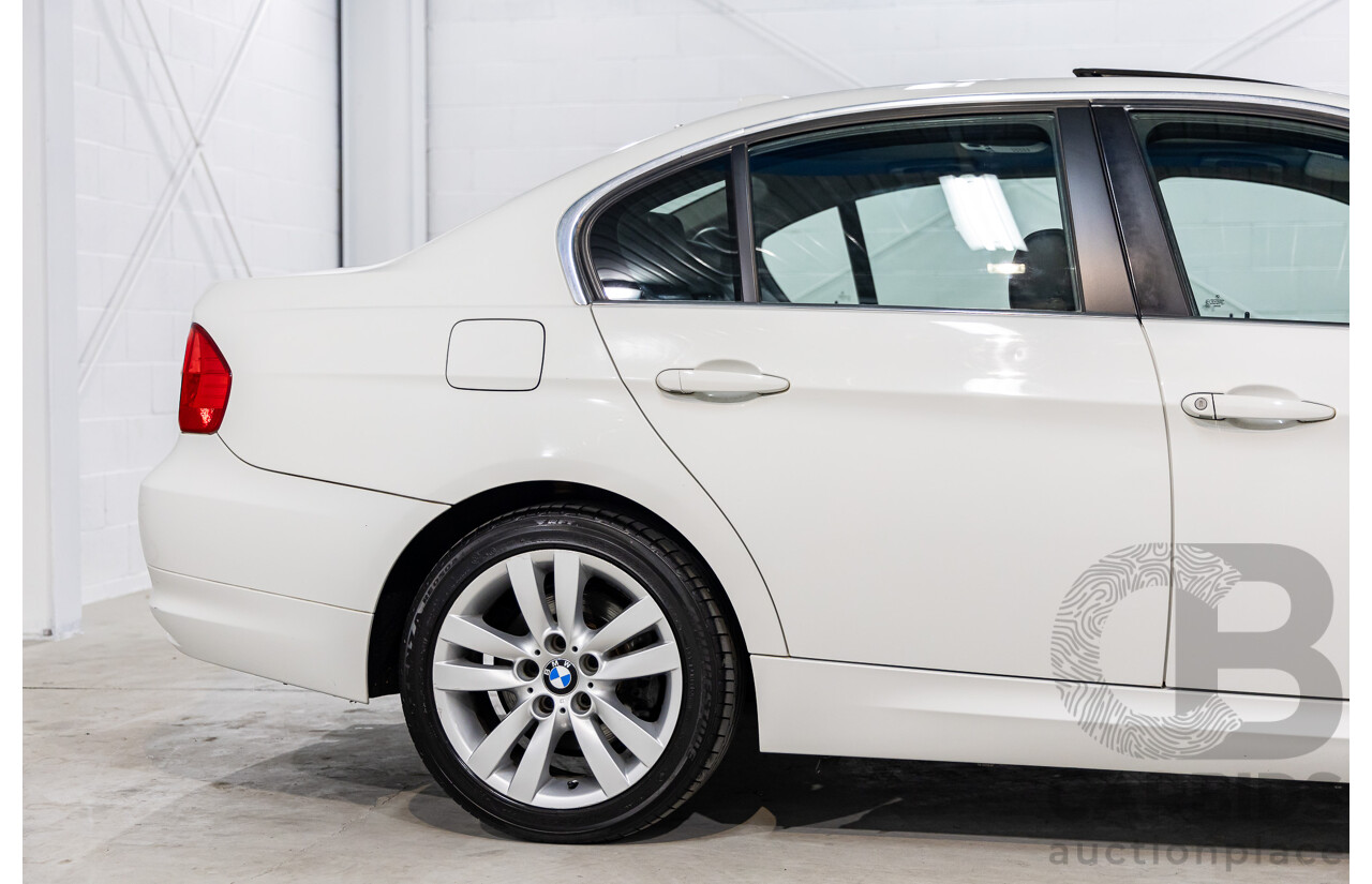 9/2010 BMW 325i Exclusive E90 MY10 4d Sedan Alpine White 2.5L