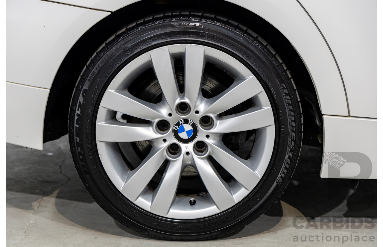 9/2010 BMW 325i Exclusive E90 MY10 4d Sedan Alpine White 2.5L