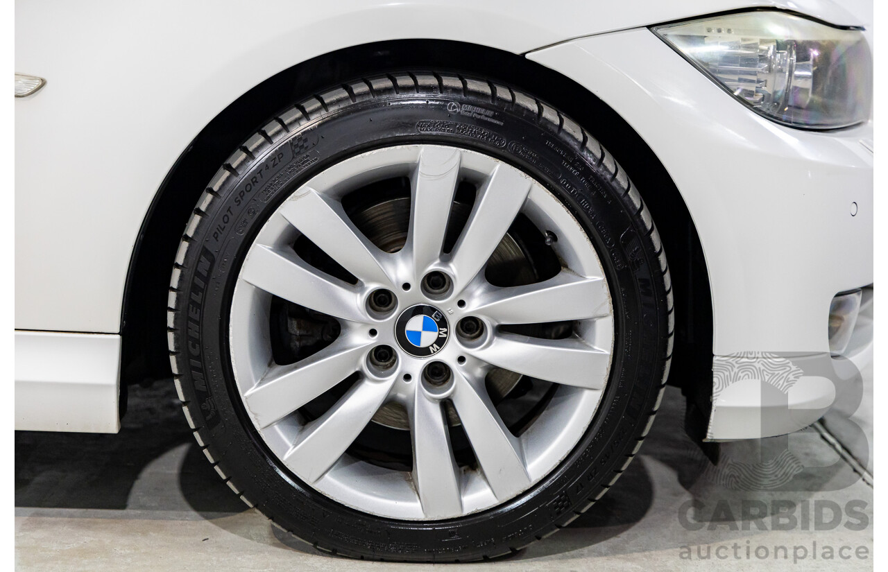 9/2010 BMW 325i Exclusive E90 MY10 4d Sedan Alpine White 2.5L