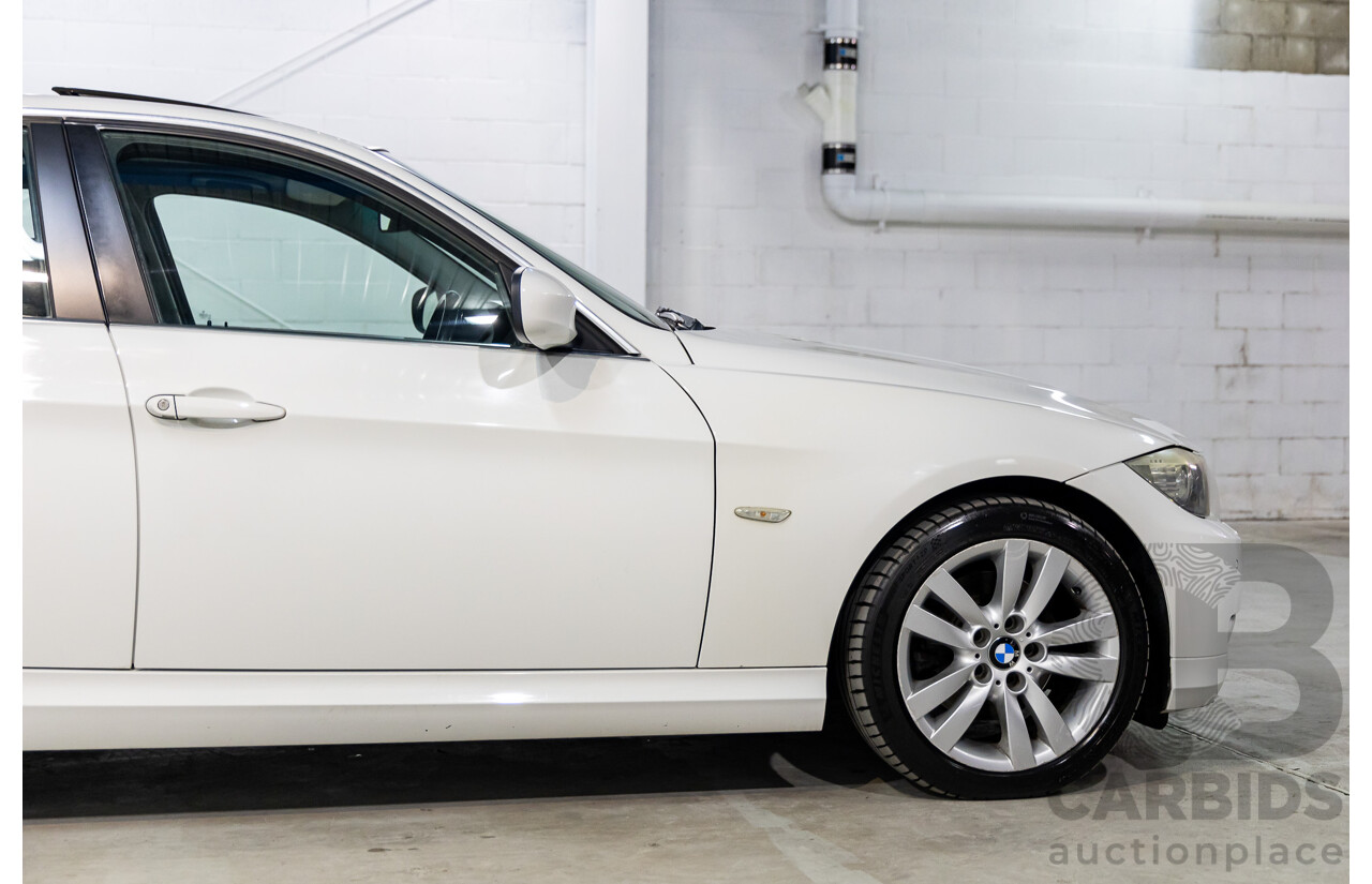 9/2010 BMW 325i Exclusive E90 MY10 4d Sedan Alpine White 2.5L