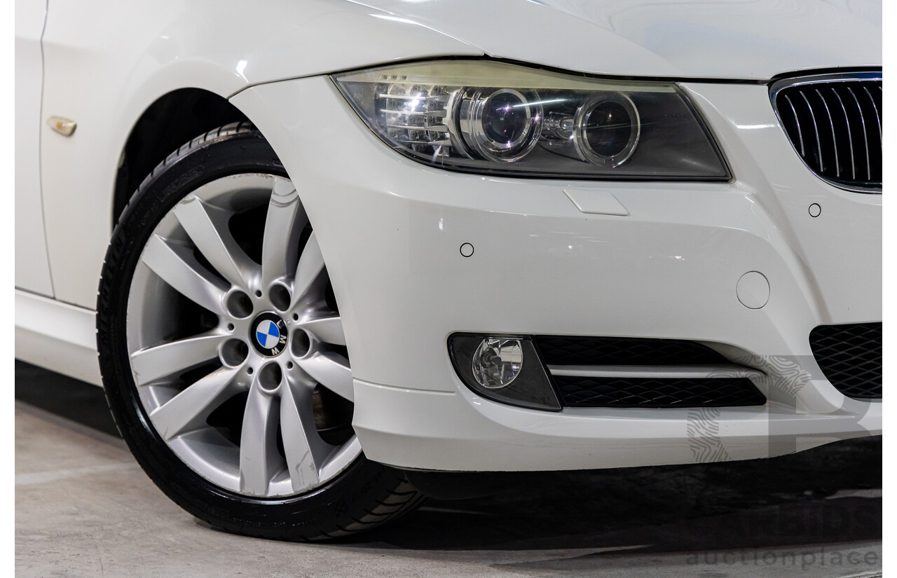 9/2010 BMW 325i Exclusive E90 MY10 4d Sedan Alpine White 2.5L