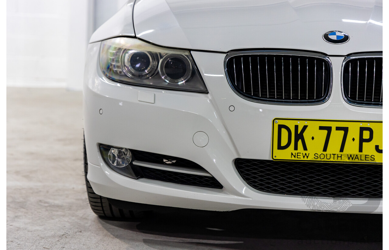 9/2010 BMW 325i Exclusive E90 MY10 4d Sedan Alpine White 2.5L