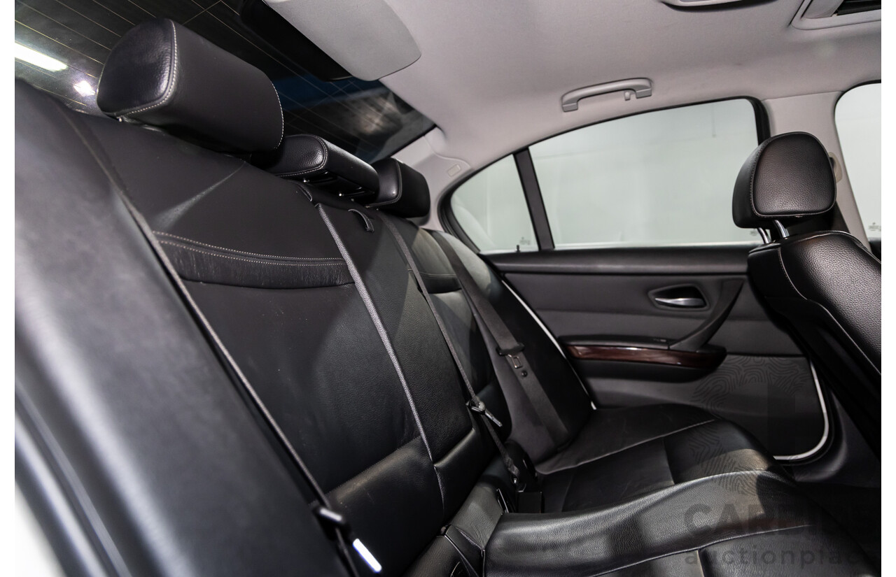 9/2010 BMW 325i Exclusive E90 MY10 4d Sedan Alpine White 2.5L