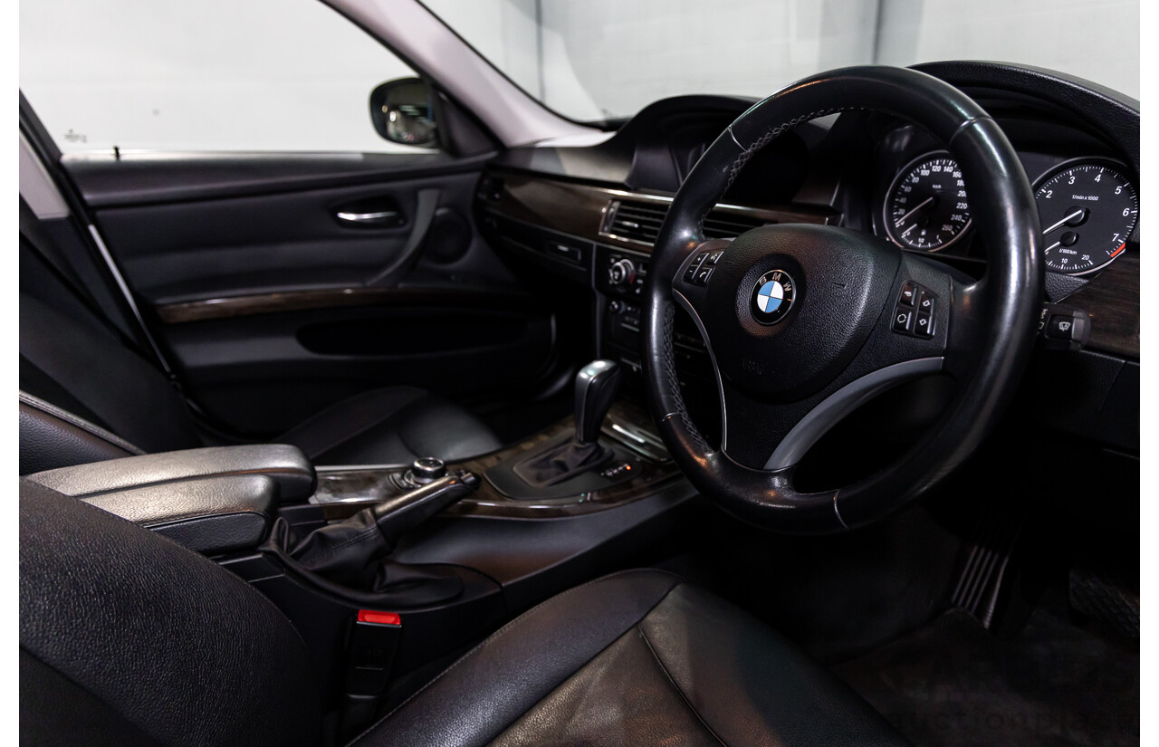 9/2010 BMW 325i Exclusive E90 MY10 4d Sedan Alpine White 2.5L