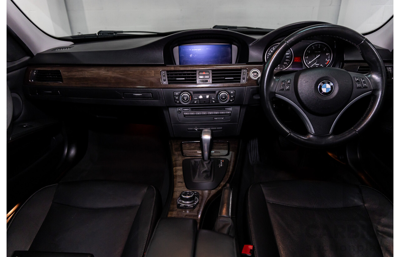 9/2010 BMW 325i Exclusive E90 MY10 4d Sedan Alpine White 2.5L