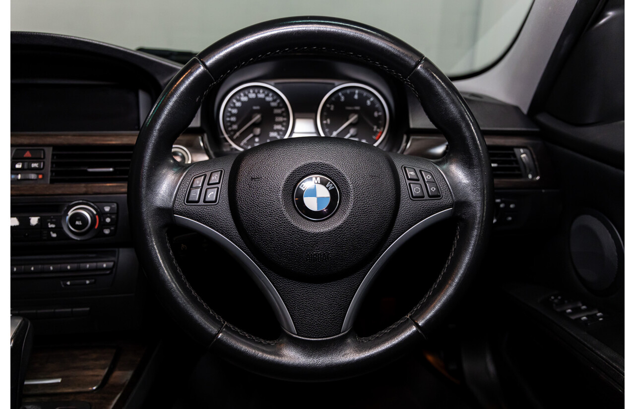 9/2010 BMW 325i Exclusive E90 MY10 4d Sedan Alpine White 2.5L