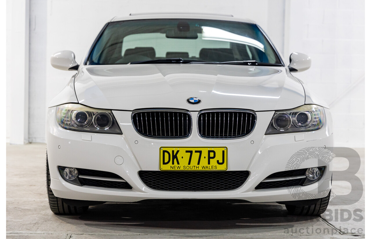 9/2010 BMW 325i Exclusive E90 MY10 4d Sedan Alpine White 2.5L