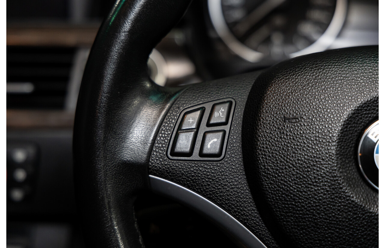 9/2010 BMW 325i Exclusive E90 MY10 4d Sedan Alpine White 2.5L