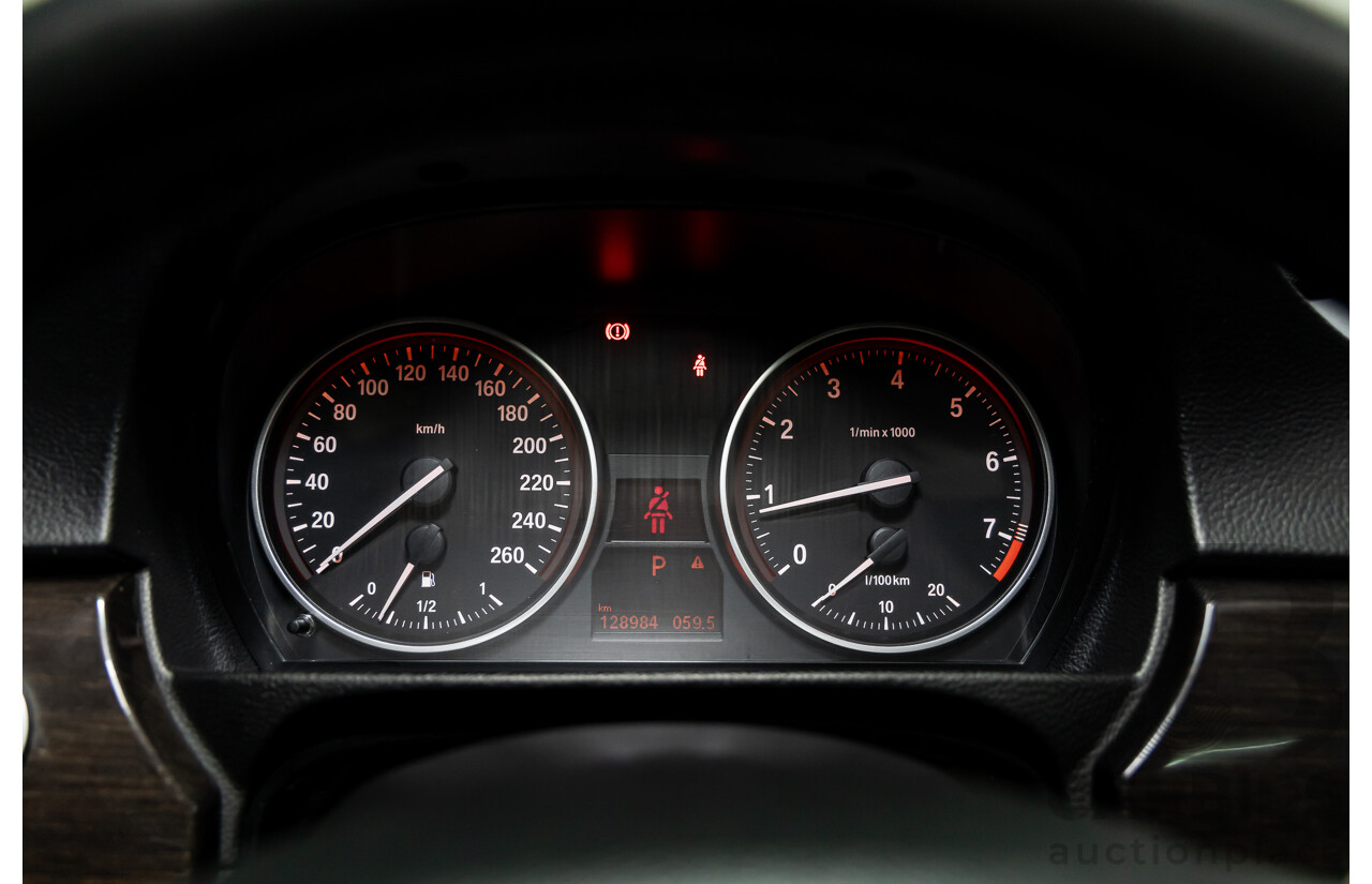 9/2010 BMW 325i Exclusive E90 MY10 4d Sedan Alpine White 2.5L