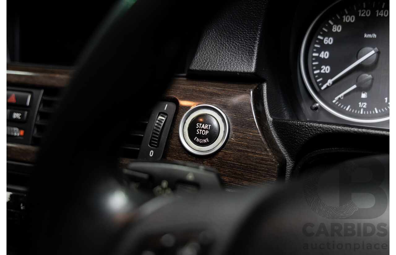 9/2010 BMW 325i Exclusive E90 MY10 4d Sedan Alpine White 2.5L