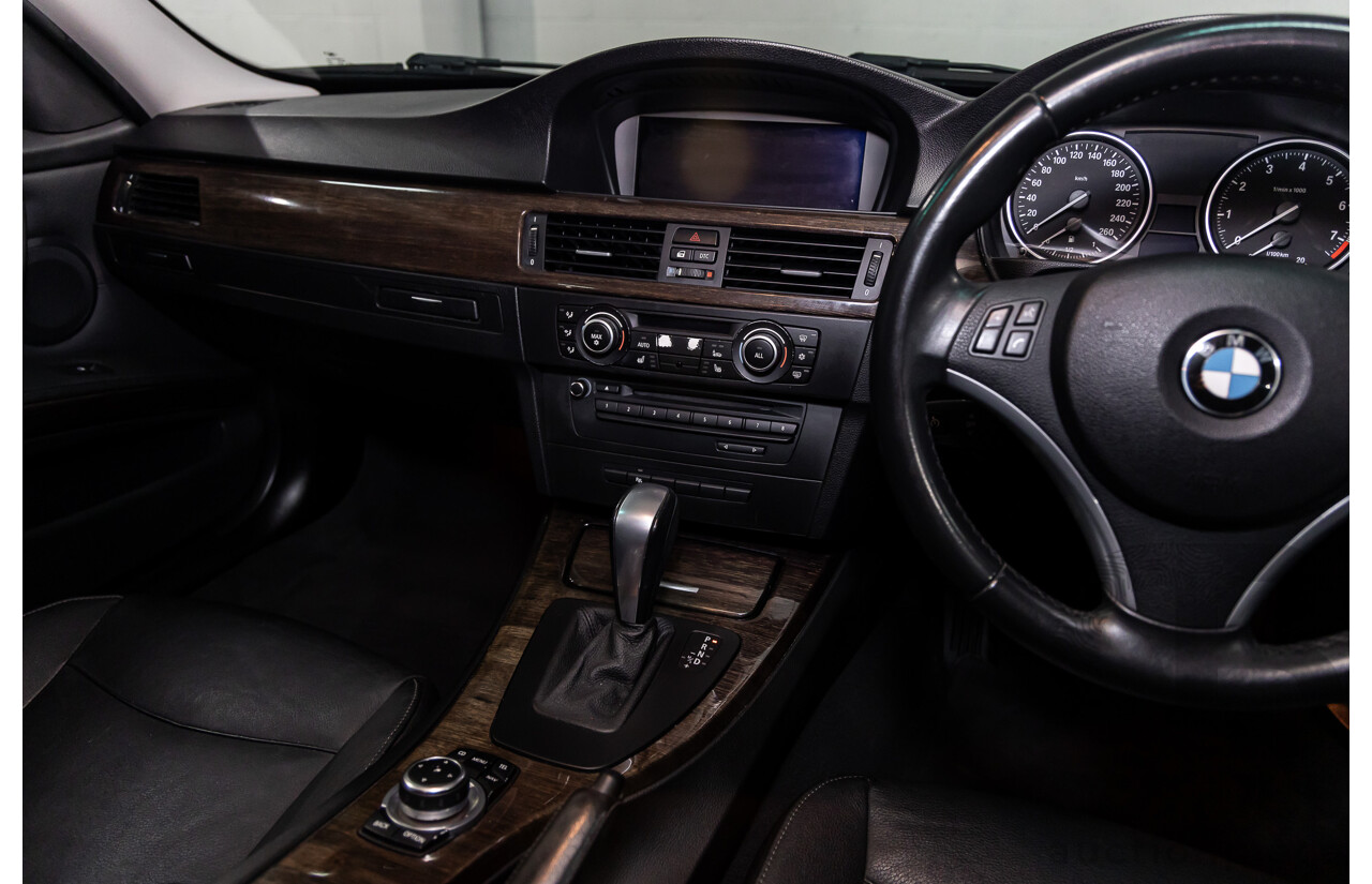 9/2010 BMW 325i Exclusive E90 MY10 4d Sedan Alpine White 2.5L