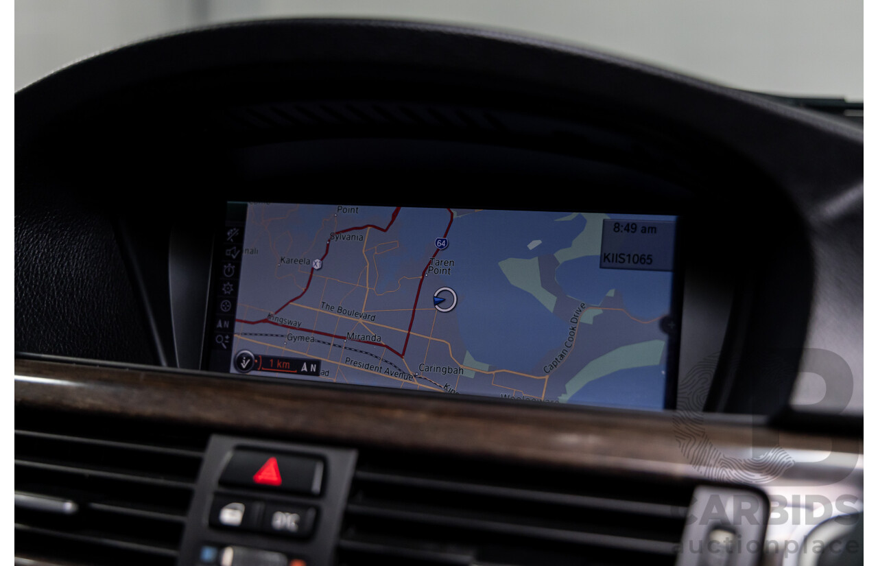 9/2010 BMW 325i Exclusive E90 MY10 4d Sedan Alpine White 2.5L