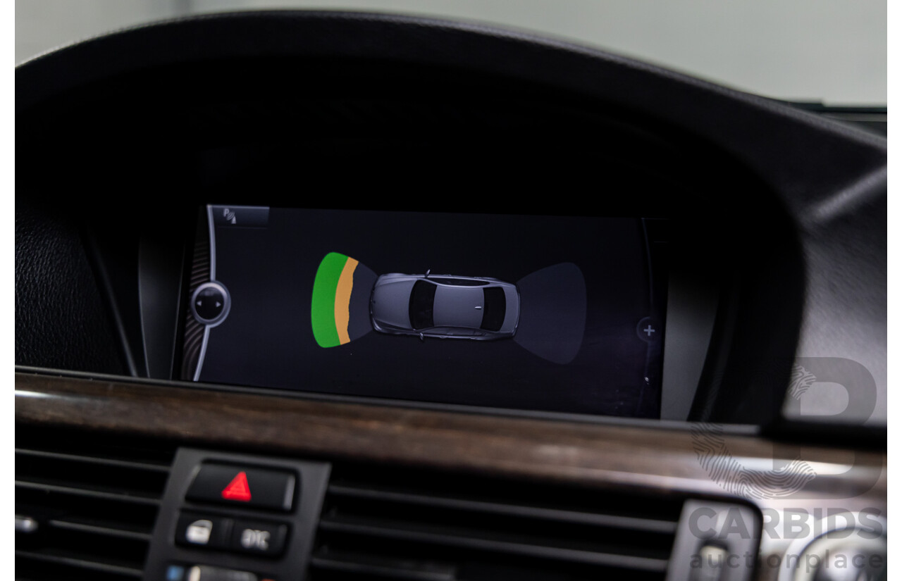 9/2010 BMW 325i Exclusive E90 MY10 4d Sedan Alpine White 2.5L