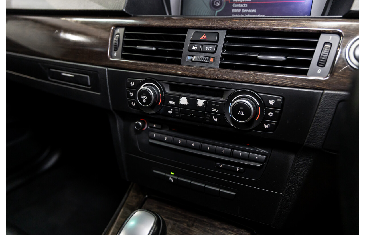 9/2010 BMW 325i Exclusive E90 MY10 4d Sedan Alpine White 2.5L