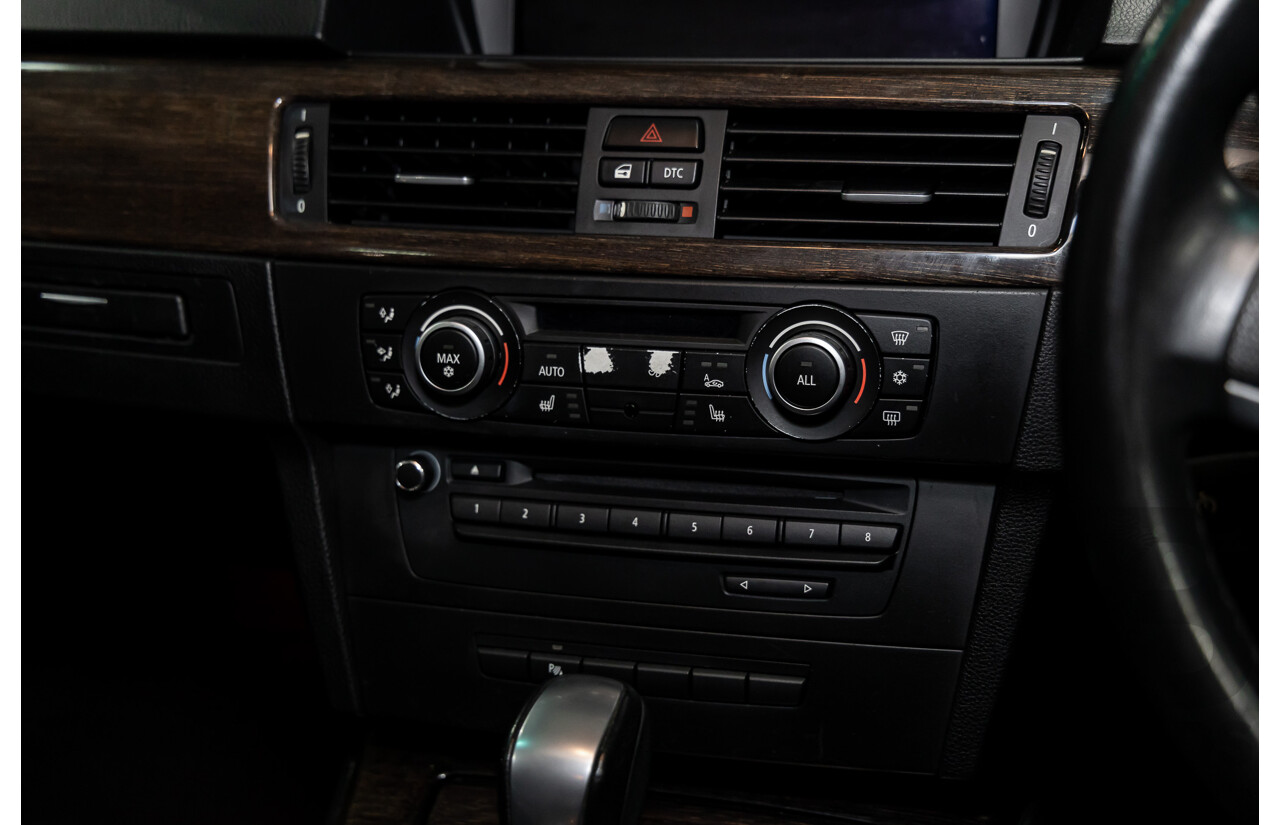 9/2010 BMW 325i Exclusive E90 MY10 4d Sedan Alpine White 2.5L