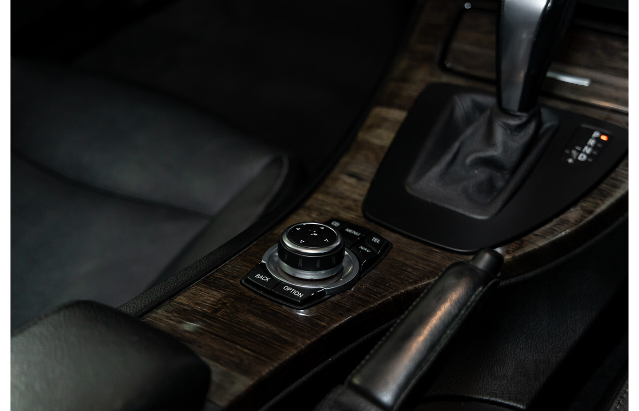 9/2010 BMW 325i Exclusive E90 MY10 4d Sedan Alpine White 2.5L