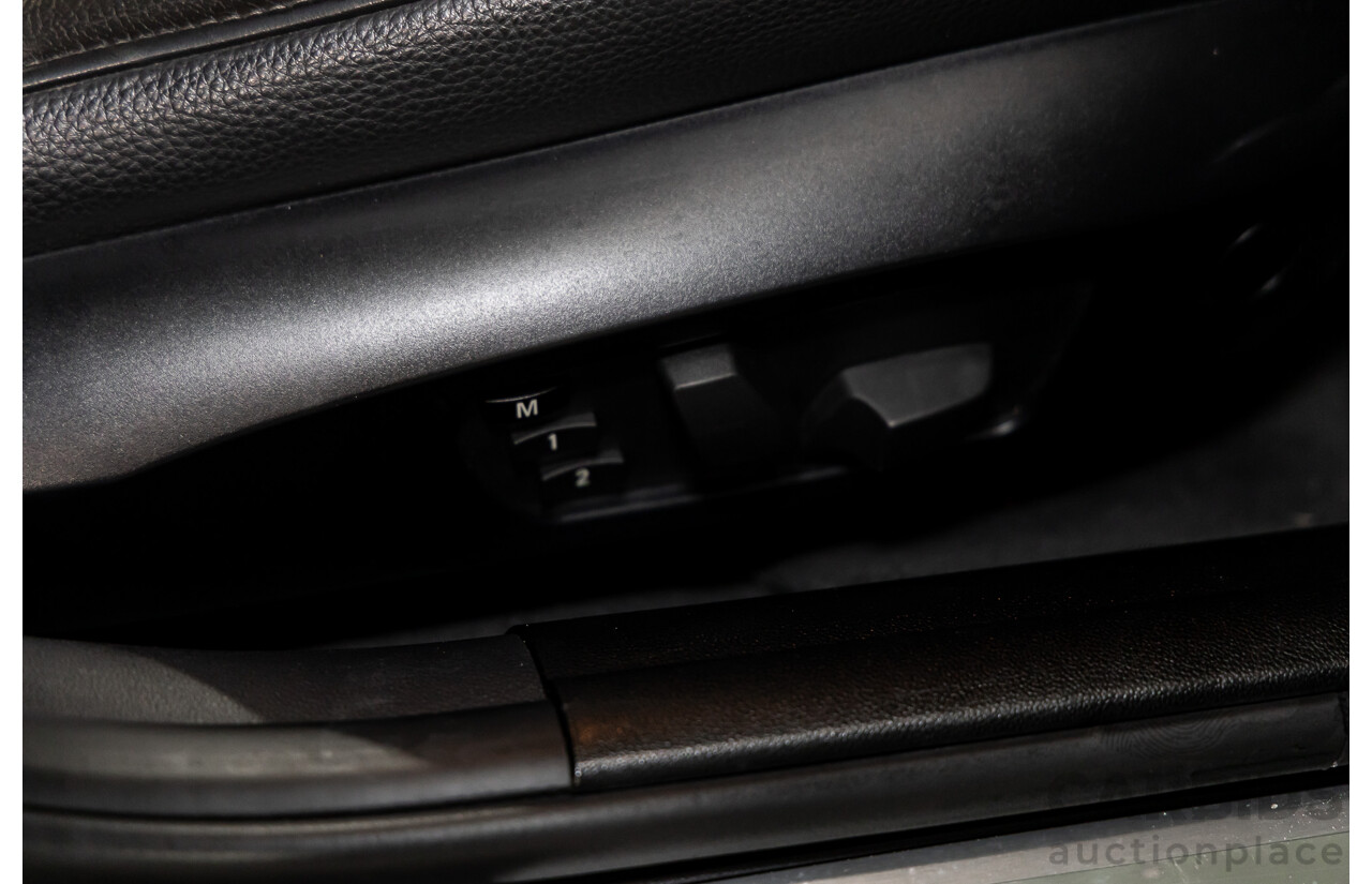 9/2010 BMW 325i Exclusive E90 MY10 4d Sedan Alpine White 2.5L