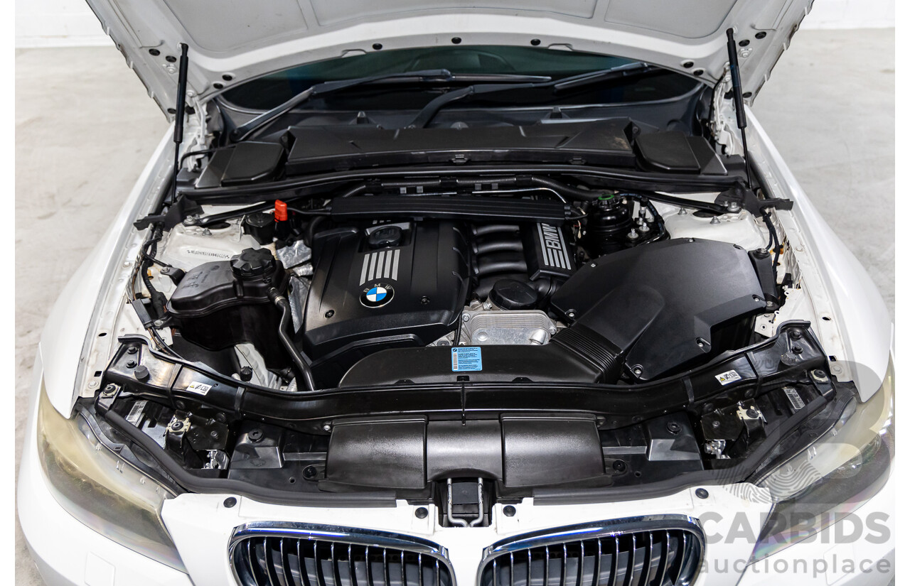 9/2010 BMW 325i Exclusive E90 MY10 4d Sedan Alpine White 2.5L