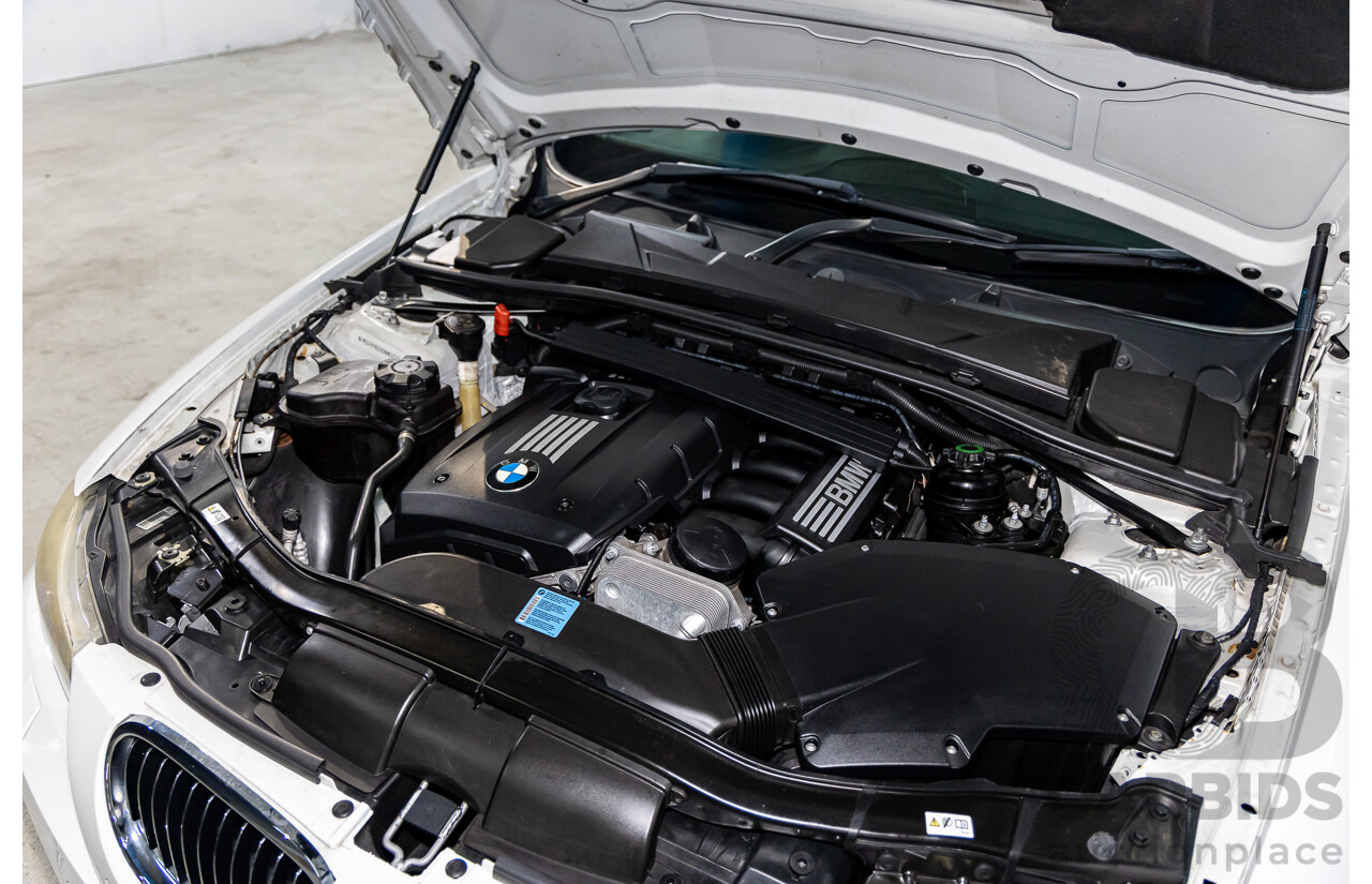 9/2010 BMW 325i Exclusive E90 MY10 4d Sedan Alpine White 2.5L