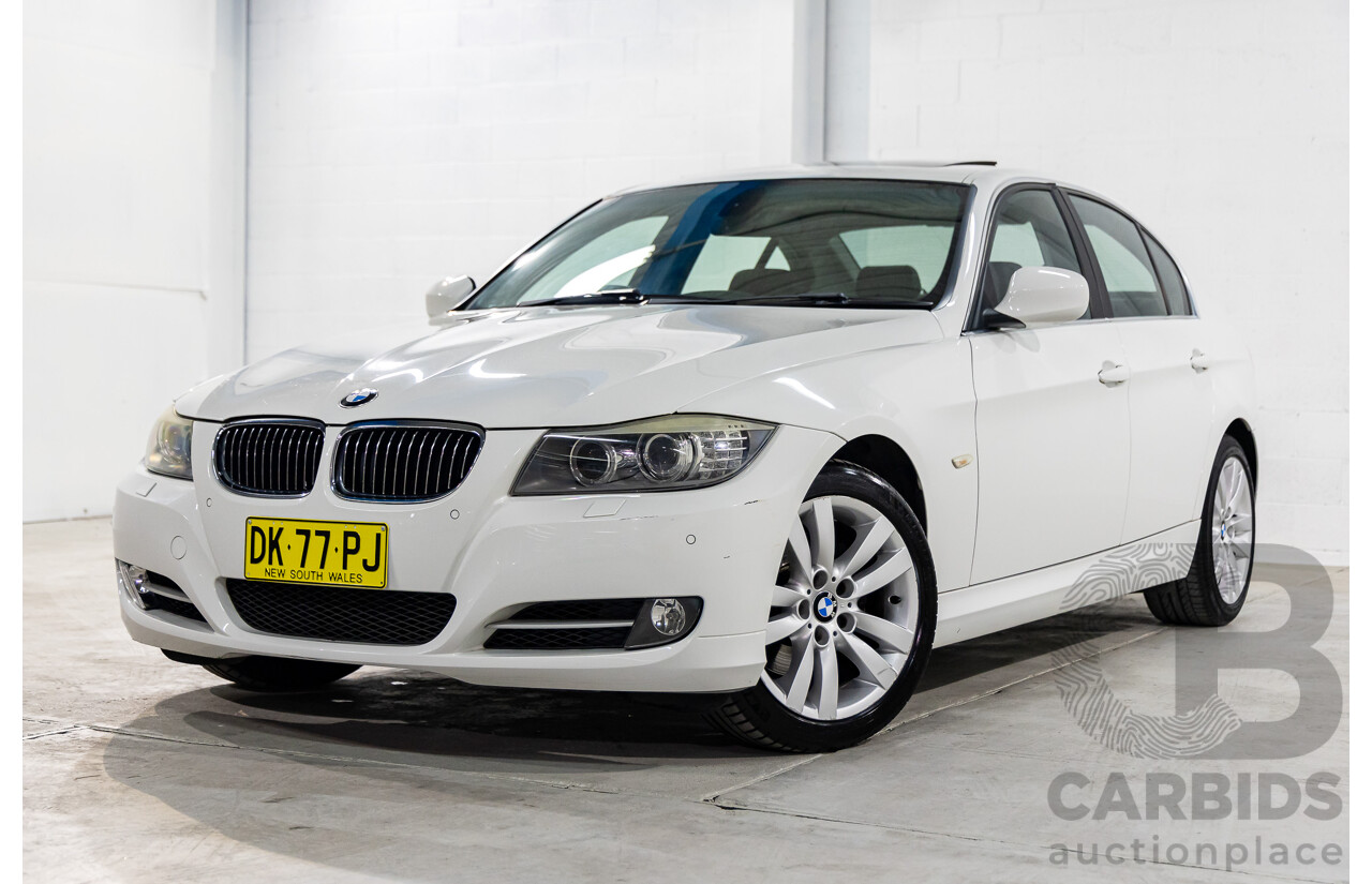 9/2010 BMW 325i Exclusive E90 MY10 4d Sedan Alpine White 2.5L
