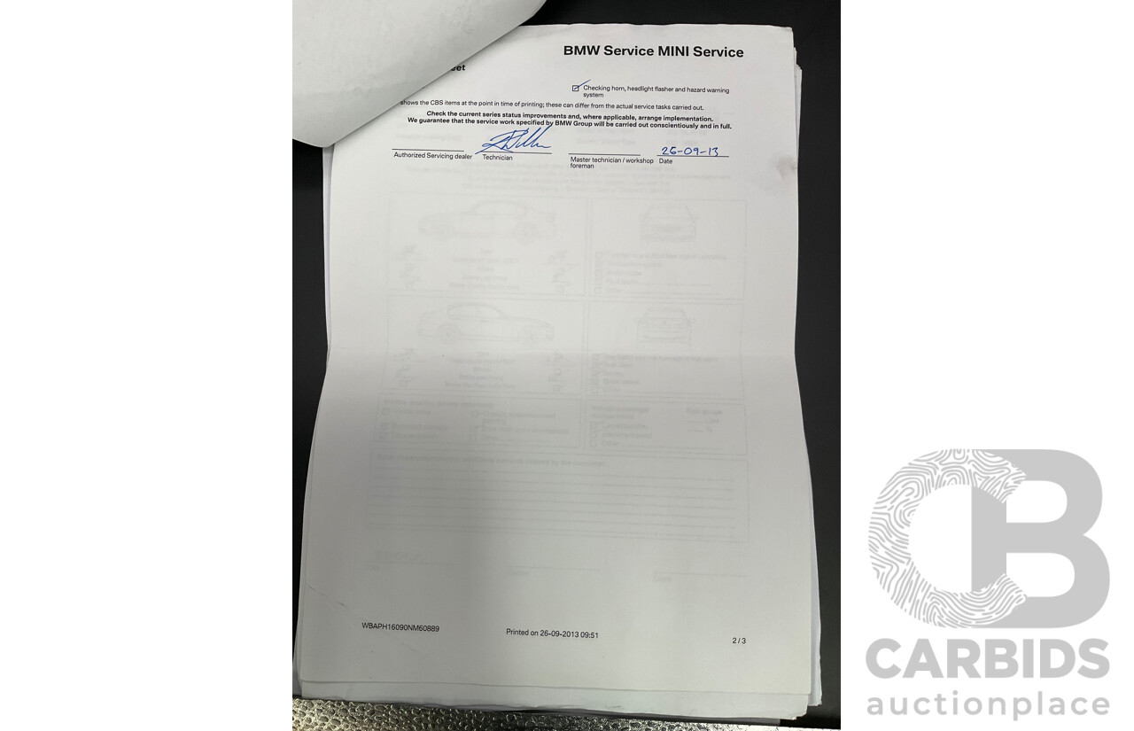 9/2010 BMW 325i Exclusive E90 MY10 4d Sedan Alpine White 2.5L