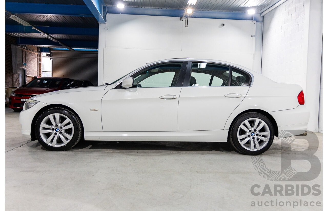 9/2010 BMW 325i Exclusive E90 MY10 4d Sedan Alpine White 2.5L