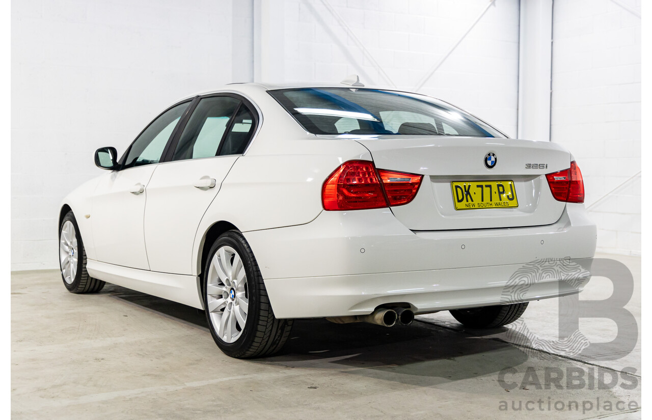 9/2010 BMW 325i Exclusive E90 MY10 4d Sedan Alpine White 2.5L