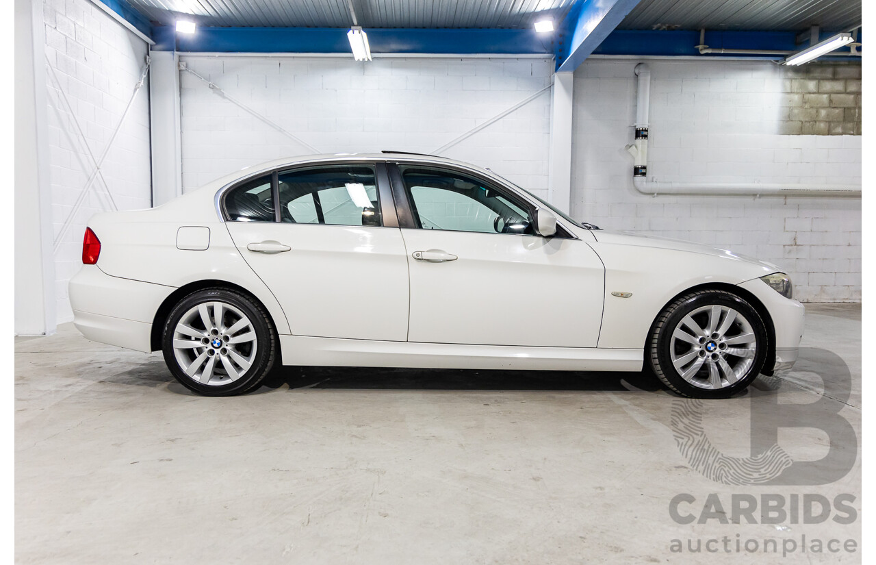 9/2010 BMW 325i Exclusive E90 MY10 4d Sedan Alpine White 2.5L