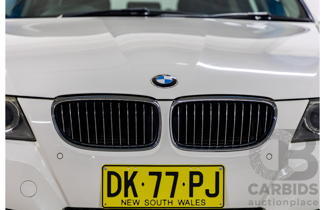 9/2010 BMW 325i Exclusive E90 MY10 4d Sedan Alpine White 2.5L