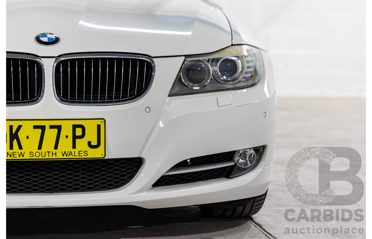 9/2010 BMW 325i Exclusive E90 MY10 4d Sedan Alpine White 2.5L