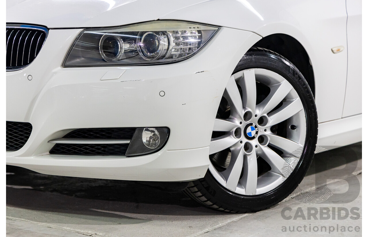 9/2010 BMW 325i Exclusive E90 MY10 4d Sedan Alpine White 2.5L