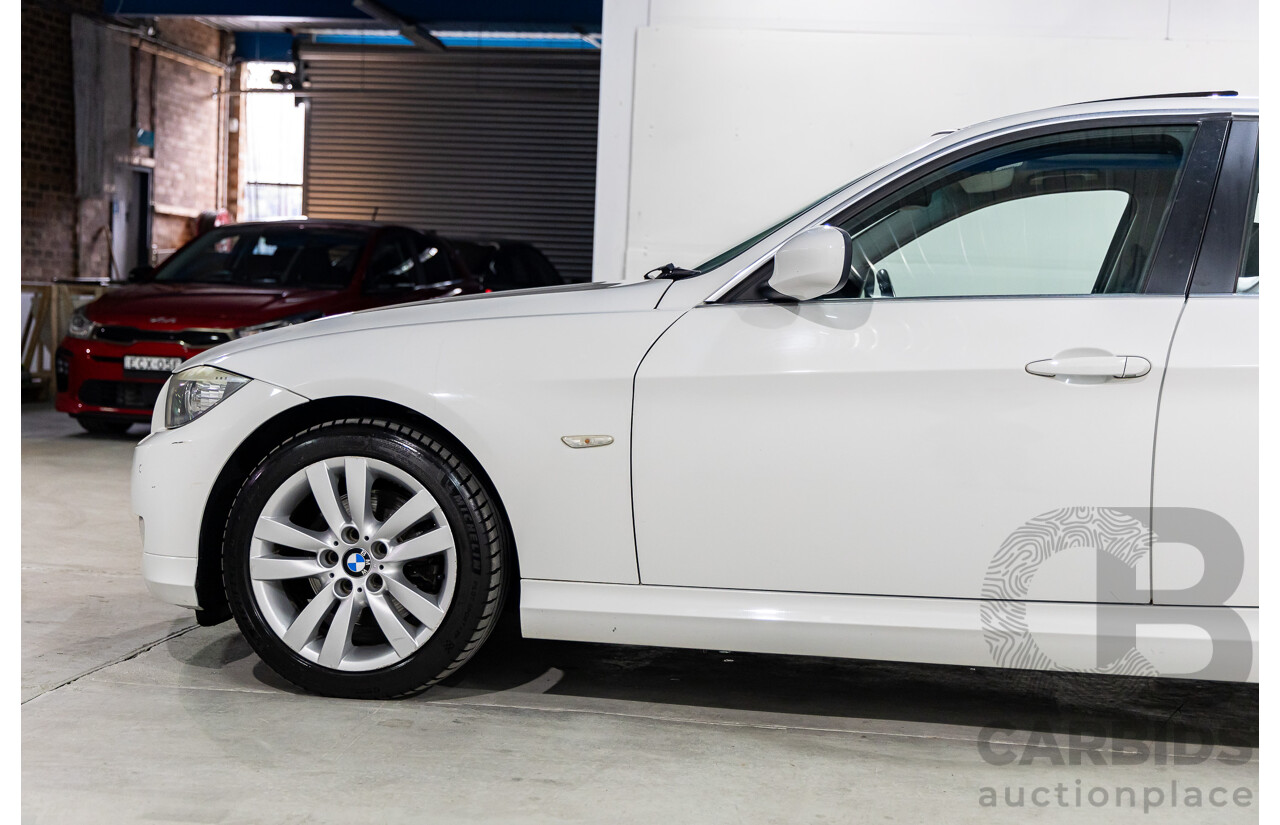 9/2010 BMW 325i Exclusive E90 MY10 4d Sedan Alpine White 2.5L