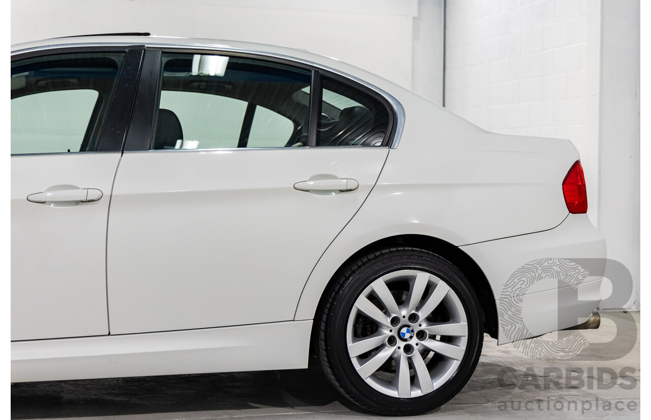9/2010 BMW 325i Exclusive E90 MY10 4d Sedan Alpine White 2.5L